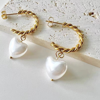 Twisting Texture Hoops With Heart Shape Pearl